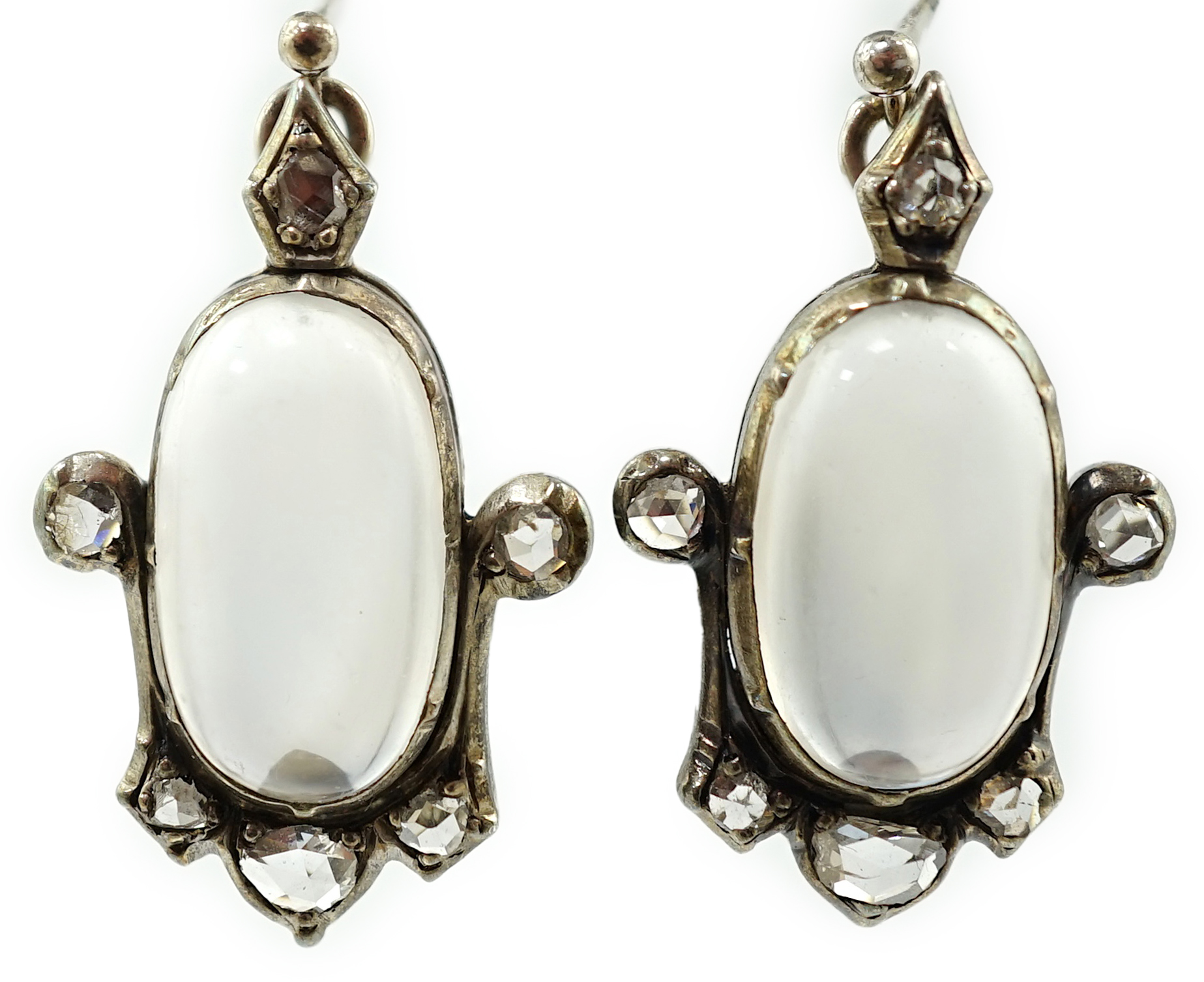 A pair of early 19th century gold and silver, cabochon moonstone and rose cut diamond cluster set drop ear clips